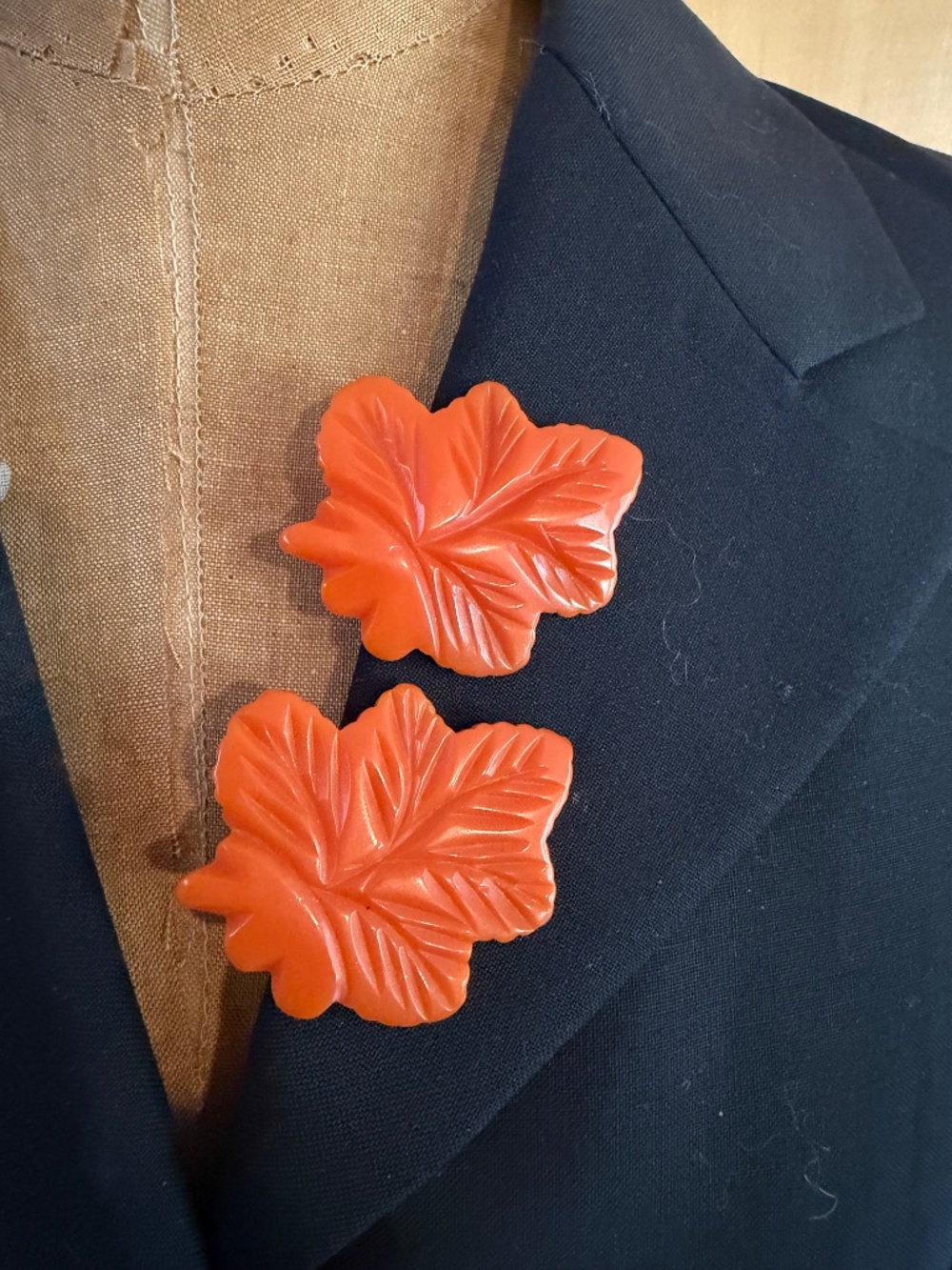 Vintage Pair of Vibrant Orange Carved Bakelite Dress Clips